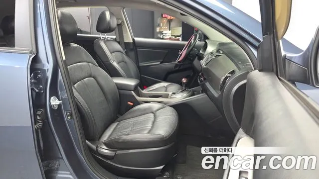 Kia Sportage — фото 10