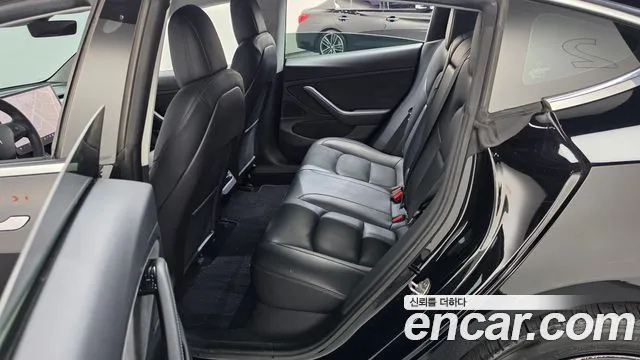 Tesla Model 3 — фото 11