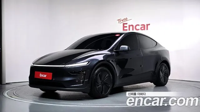 Tesla Model Y — фото 1