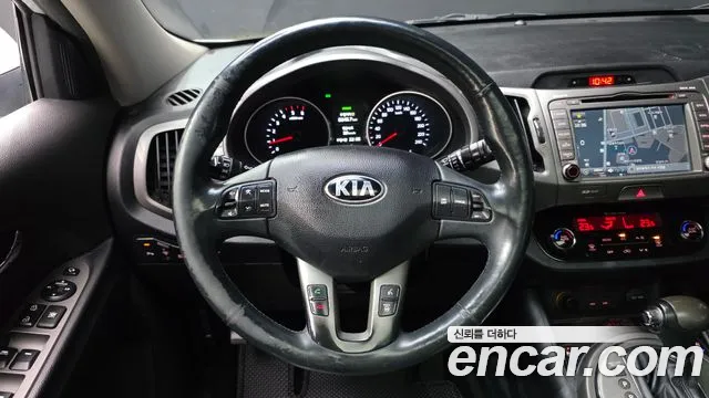 Kia Sportage — фото 13
