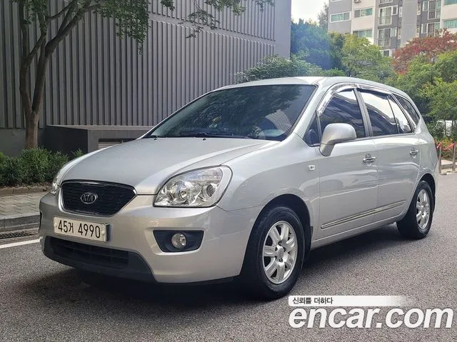 Kia Carens — фото 1