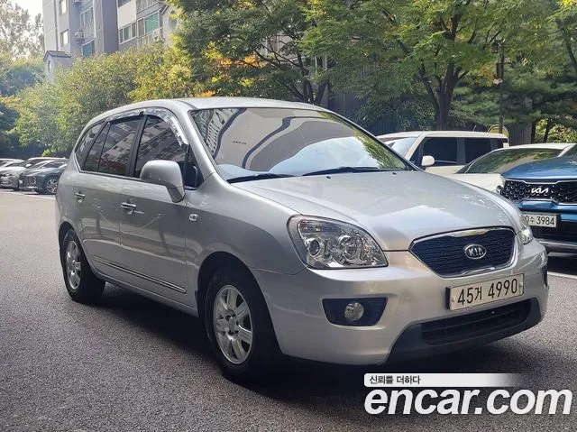 Kia Carens — фото 19