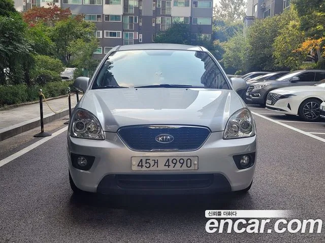 Kia Carens — фото 3
