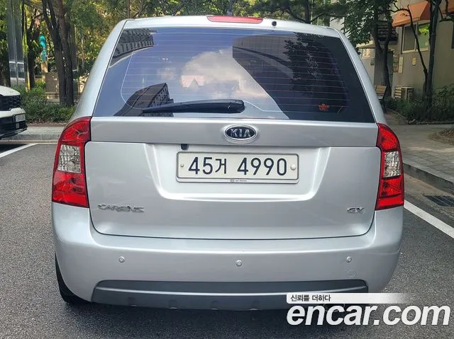 Kia Carens — фото 4
