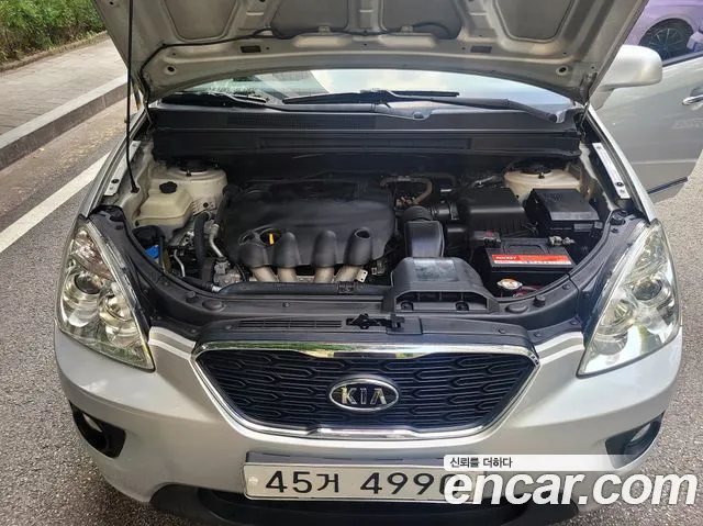 Kia Carens — фото 6