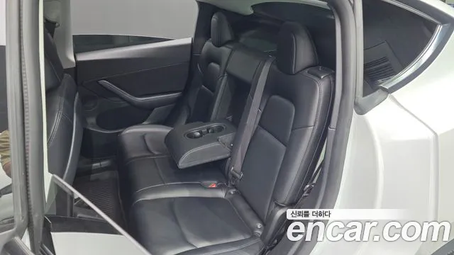 Tesla Model Y — фото 12