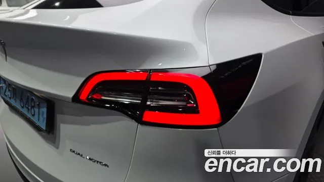 Tesla Model Y — фото 23