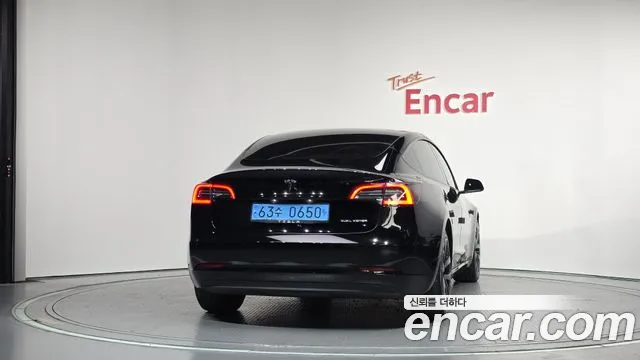 Tesla Model 3 — фото 4