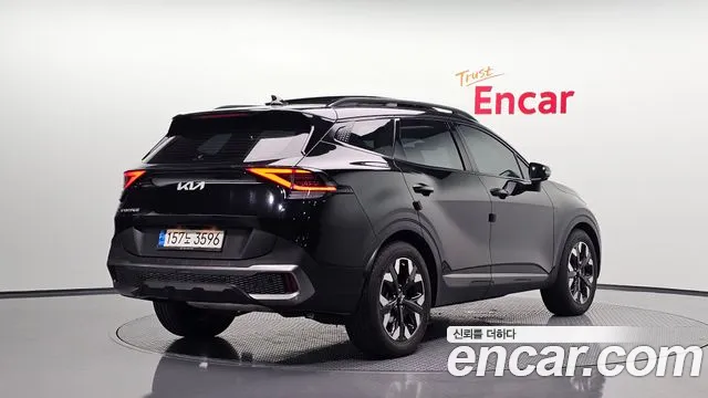 Kia Sportage — фото 1