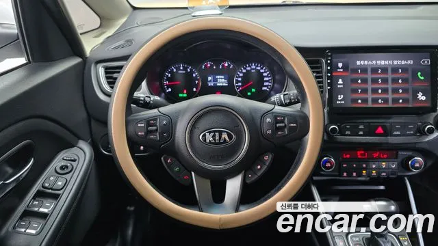 Kia Carens — фото 13