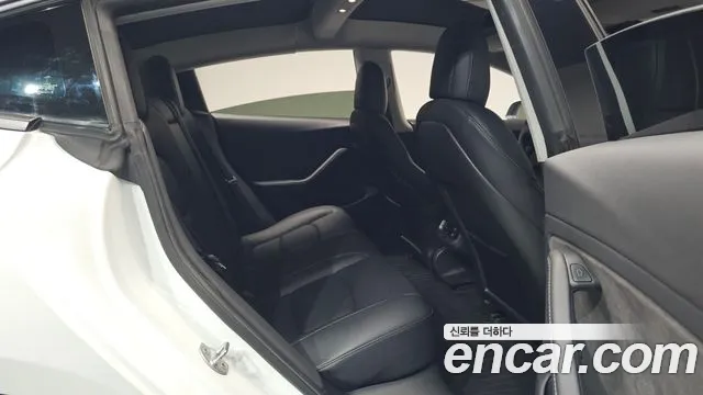 Tesla Model 3 — фото 11