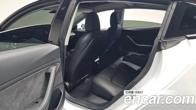 Tesla Model 3 — фото 12