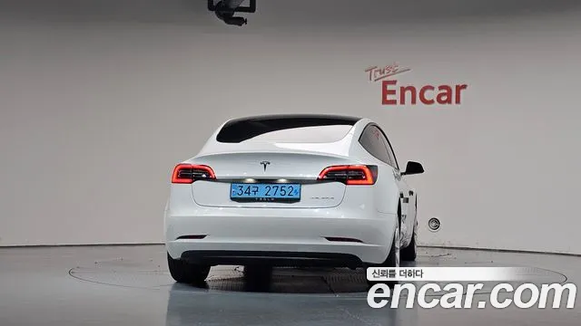 Tesla Model 3 — фото 4