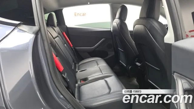 Tesla Model Y — фото 11