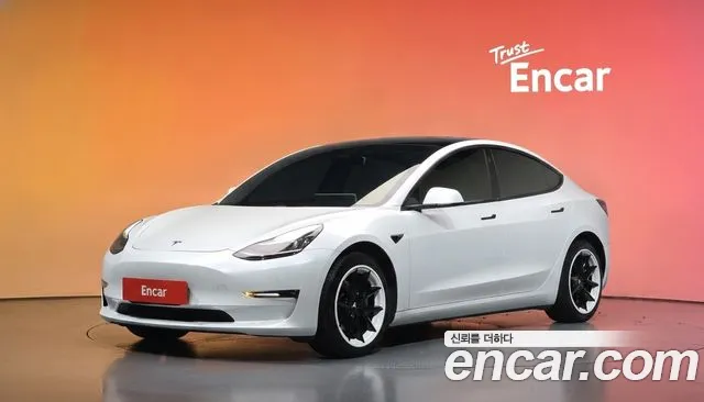 Tesla Model 3 — фото 20