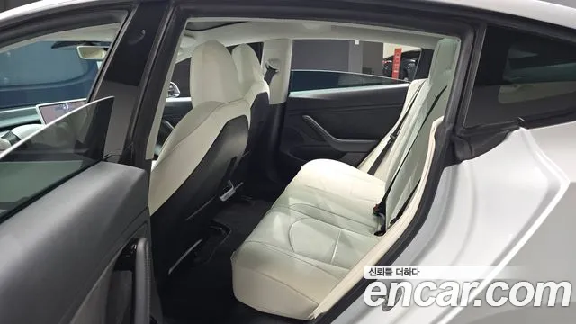 Tesla Model 3 — фото 10