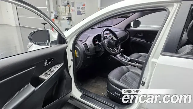 Kia Sportage — фото 10