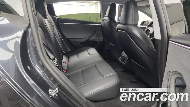 Tesla Model 3 — фото 11