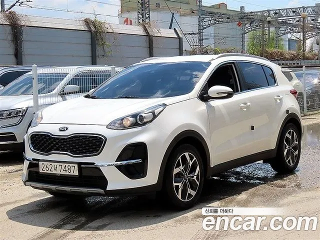 Kia Sportage — фото 1