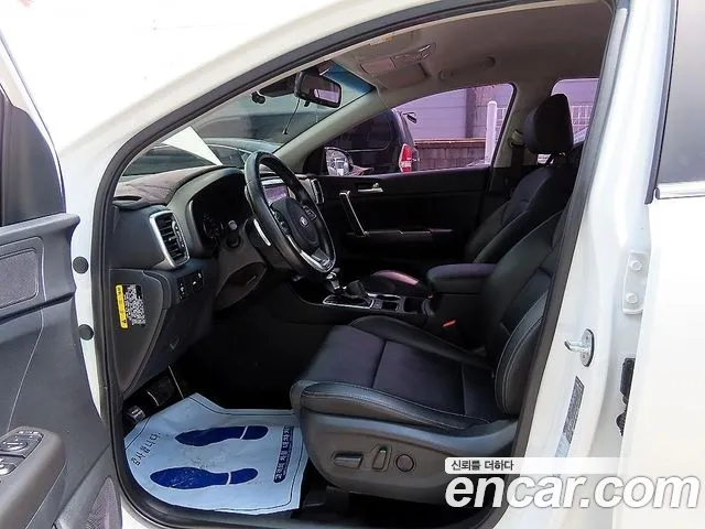 Kia Sportage — фото 19