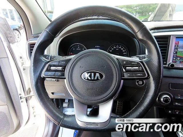 Kia Sportage — фото 7