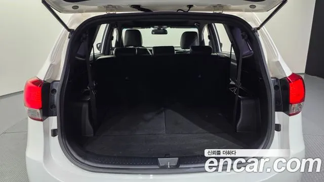 Kia Carens — фото 20