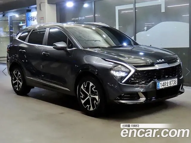 Kia Sportage — фото 1