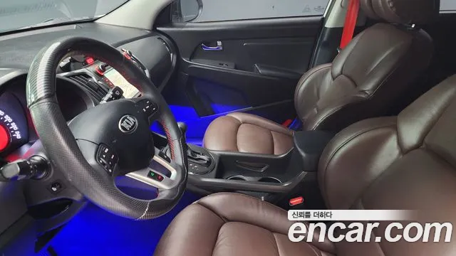 Kia Sportage — фото 11