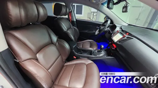 Kia Sportage — фото 12
