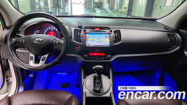 Kia Sportage — фото 10