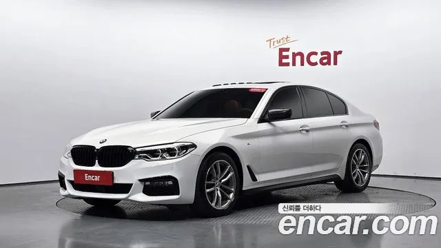 BMW 5-Series — фото 1