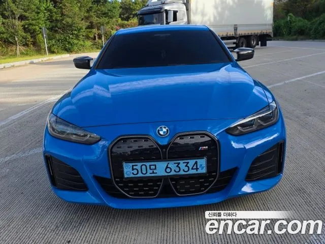 BMW i4 — фото 1