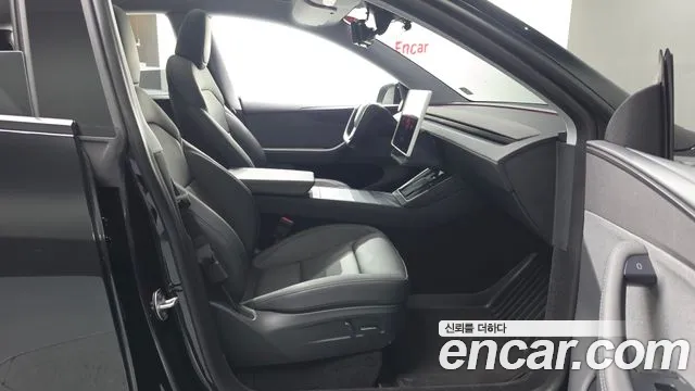 Tesla Model Y — фото 11