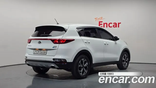 Kia Sportage — фото 1
