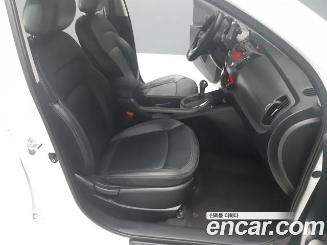 Kia Sportage — фото 11