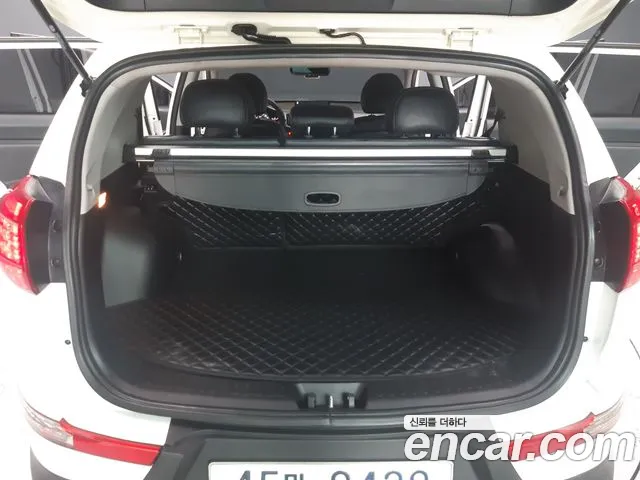 Kia Sportage — фото 14