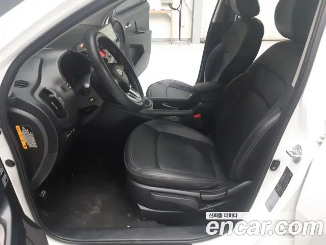 Kia Sportage — фото 10