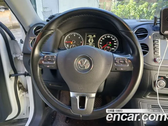 Volkswagen Tiguan — фото 14