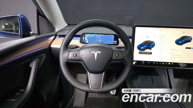 Tesla Model Y — фото 13