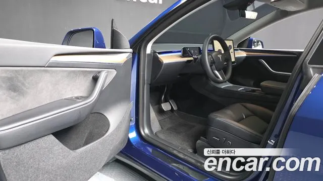 Tesla Model Y — фото 10