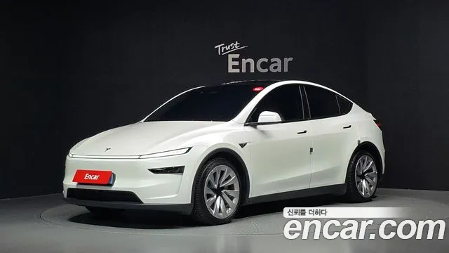 Tesla Model Y — фото 1