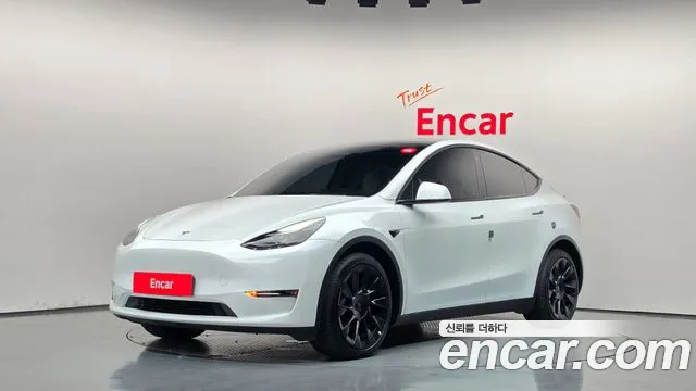 Tesla Model Y — фото 1