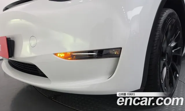 Tesla Model Y — фото 20