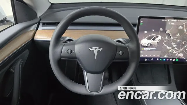 Tesla Model Y — фото 11