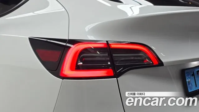 Tesla Model Y — фото 23