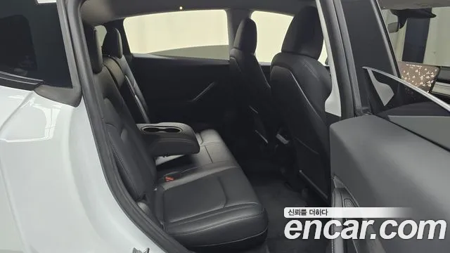 Tesla Model Y — фото 10