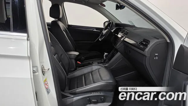 Volkswagen Tiguan — фото 26