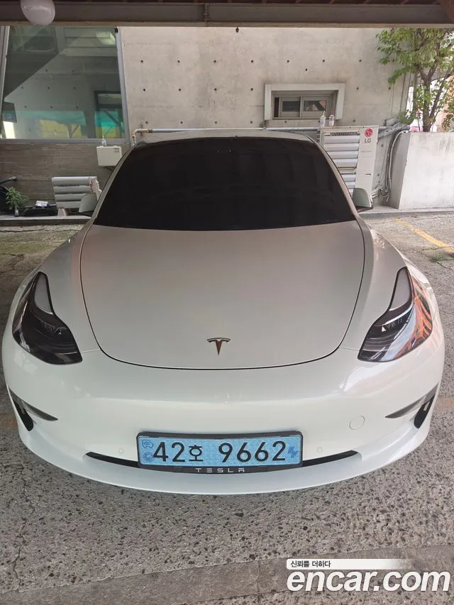 Tesla Model 3 — фото 7