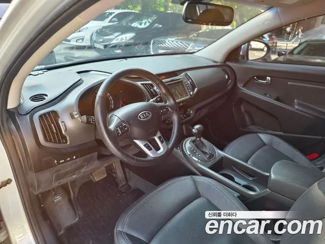 Kia Sportage — фото 7