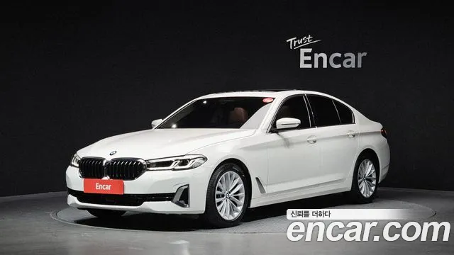 BMW 5-Series — фото 1
